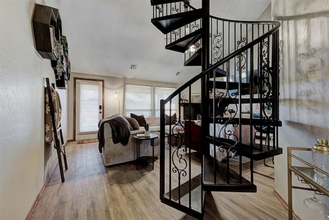 17009 Picasso Dr, Oklahoma City, OK 73170 - staircase featuring wood finished floors and baseboards