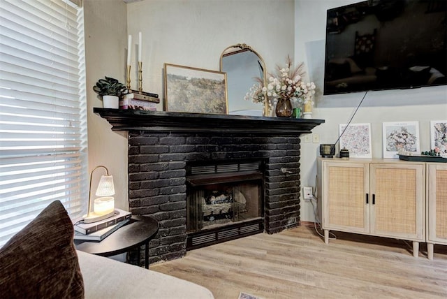 17009 Picasso Dr, Oklahoma City, OK 73170 - living area featuring a fireplace and wood finished floors
