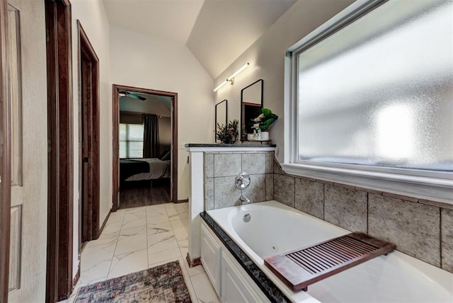 17009 Picasso Dr, Oklahoma City, OK 73170 - ensuite bathroom featuring marble finish flooring, a whirlpool tub, and vaulted ceiling