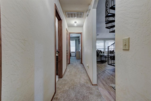 17009 Picasso Dr, Oklahoma City, OK 73170 - corridor featuring carpet flooring and a textured wall
