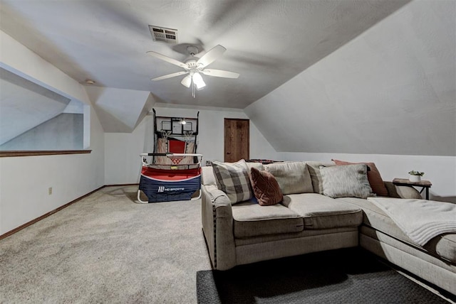 17009 Picasso Dr, Oklahoma City, OK 73170 - carpeted living area featuring vaulted ceiling, baseboards, and a ceiling fan