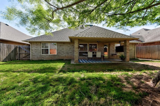 17009 Picasso Dr, Oklahoma City, OK 73170 - rear view of property with brick siding, a patio, a shingled roof, and a gate