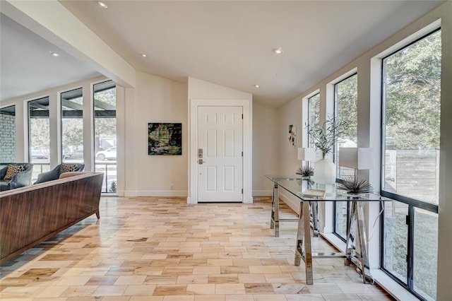 office space with vaulted ceiling, baseboards, and recessed lighting