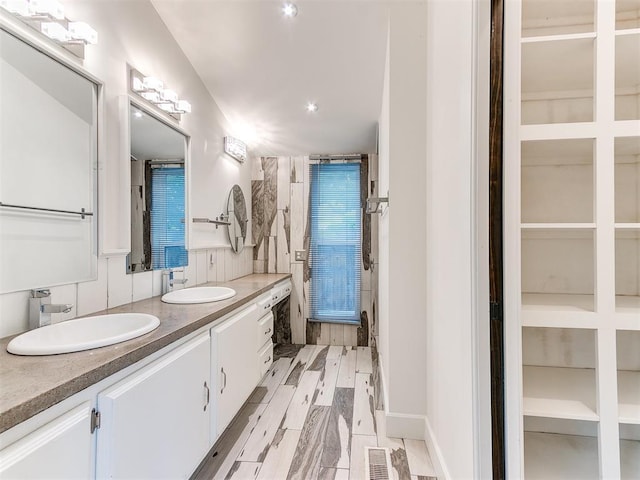 bathroom with double vanity
