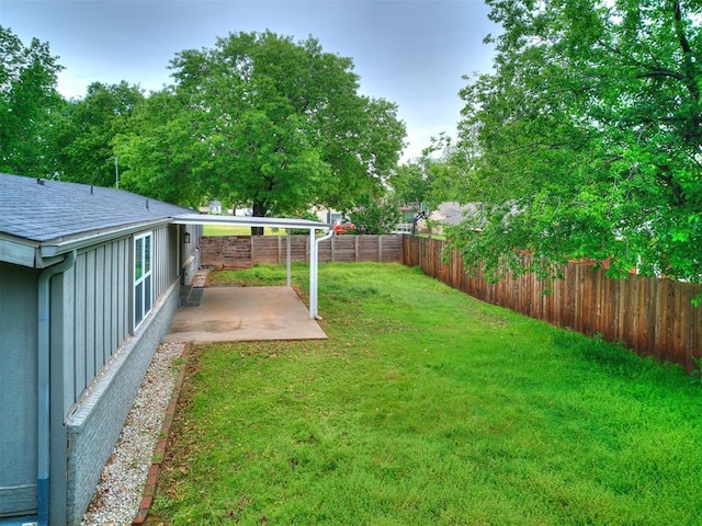 view of yard with a patio area
