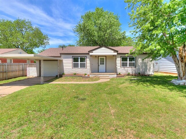 213 E Haddock St, Norman, OK 73069 - ranch-style home featuring driveway, an attached garage, a carport, and a shingled roof