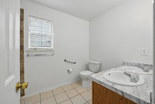 236 NW 91st St, Oklahoma City, OK 73114 - bathroom with toilet, tile patterned flooring, vanity, and baseboards
