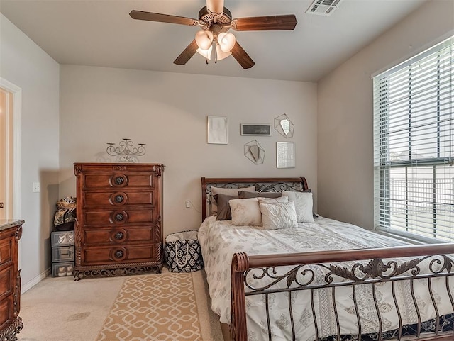 12515 Forest Oaks Dr, Choctaw, OK 73020 - bedroom with light carpet and a ceiling fan