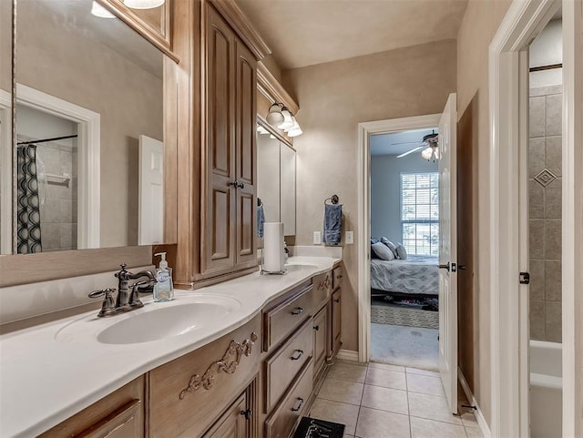 12515 Forest Oaks Dr, Choctaw, OK 73020 - full bath featuring tile patterned flooring, a shower with curtain, a ceiling fan, double vanity, and baseboards