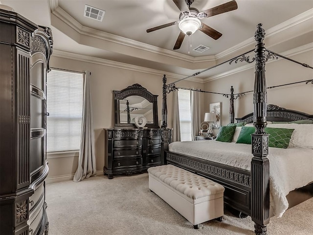 12515 Forest Oaks Dr, Choctaw, OK 73020 - bedroom featuring carpet flooring, a tray ceiling, crown molding, baseboards, and a ceiling fan