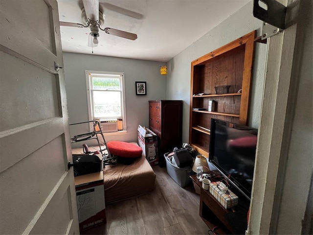 6616 SW 134th St, Oklahoma City, OK 73173 - living area with wood finished floors, ceiling fan, and cooling unit