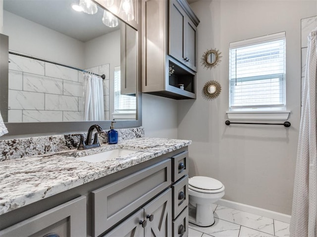 12125 SW 51st St, Mustang, OK 73064 - bathroom featuring marble finish floors, toilet, vanity, baseboards, and a shower with shower curtain