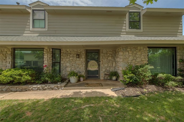 11412 Leaning Elm Rd, Oklahoma City, OK 73120 - view of front of house with stone siding and a front yard