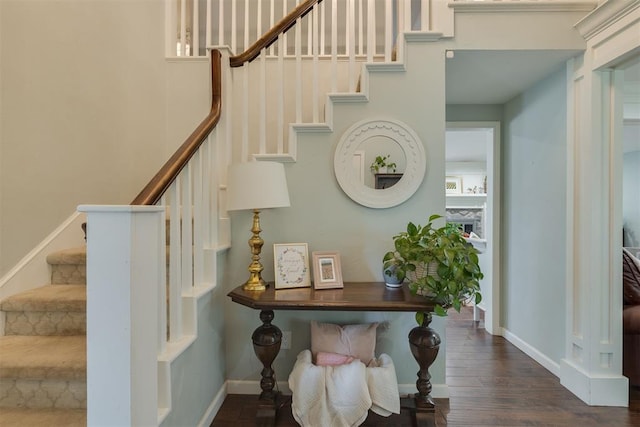 11412 Leaning Elm Rd, Oklahoma City, OK 73120 - stairs with baseboards and wood finished floors