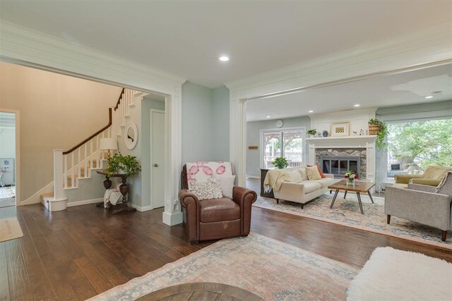 11412 Leaning Elm Rd, Oklahoma City, OK 73120 - living room featuring wood-type flooring, stairs, healthy amount of natural light, baseboards, and recessed lighting
