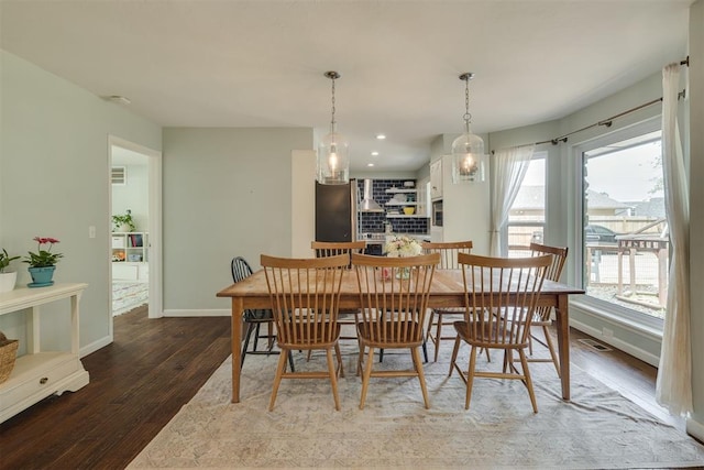11412 Leaning Elm Rd, Oklahoma City, OK 73120 - dining room with baseboards, hardwood / wood-style floors, and recessed lighting