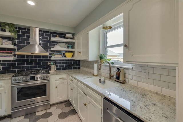 11412 Leaning Elm Rd, Oklahoma City, OK 73120 - kitchen with appliances with stainless steel finishes, wall chimney exhaust hood, a sink, open shelves, and white cabinets