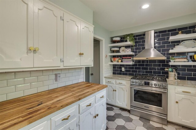 11412 Leaning Elm Rd, Oklahoma City, OK 73120 - kitchen featuring gas range, wall chimney exhaust hood, open shelves, butcher block counters, and decorative backsplash