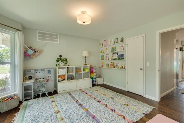 11412 Leaning Elm Rd, Oklahoma City, OK 73120 - rec room featuring dark wood-type flooring and baseboards