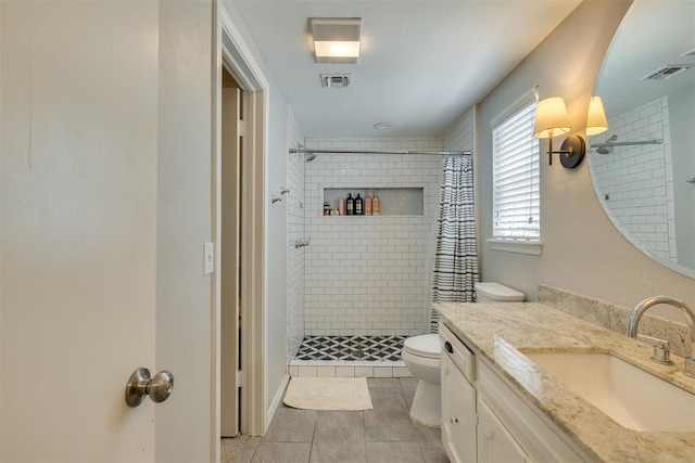 11412 Leaning Elm Rd, Oklahoma City, OK 73120 - full bath featuring toilet, a tile shower, tile patterned floors, and vanity