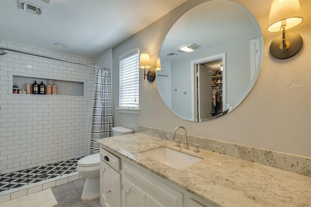 11412 Leaning Elm Rd, Oklahoma City, OK 73120 - full bath with toilet, a stall shower, and vanity