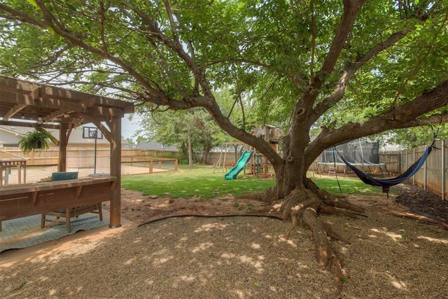 11412 Leaning Elm Rd, Oklahoma City, OK 73120 - view of yard featuring a playground and a pergola