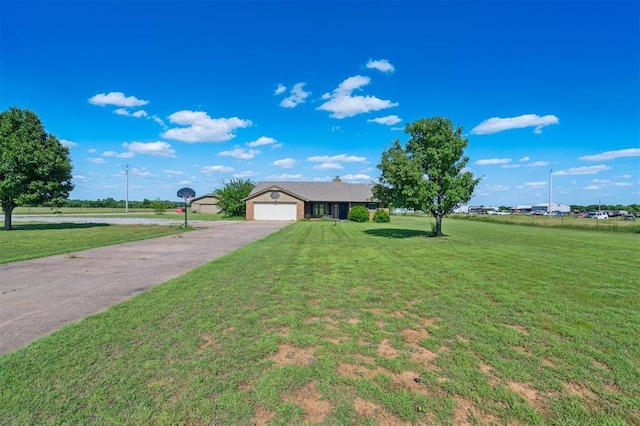 1500 S Railroad, Marlow, OK 73055 - ranch-style house with a front yard, driveway, and a garage