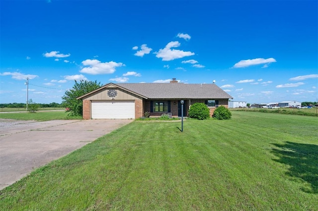 1500 S Railroad, Marlow, OK 73055 - ranch-style house featuring a front yard, driveway, an attached garage, brick siding, and a chimney
