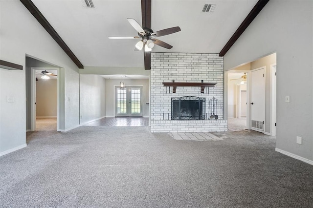 1500 S Railroad, Marlow, OK 73055 - unfurnished living room featuring ceiling fan, carpet flooring, a brick fireplace, beamed ceiling, and high vaulted ceiling