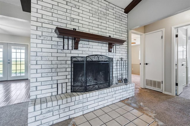 1500 S Railroad, Marlow, OK 73055 - detailed view of beam ceiling, a fireplace, french doors, carpet flooring, and baseboards