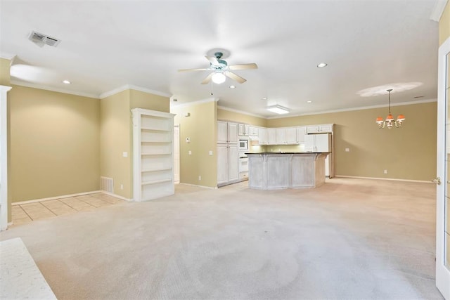 unfurnished living room with ceiling fan, baseboards, light carpet, a chandelier, and recessed lighting