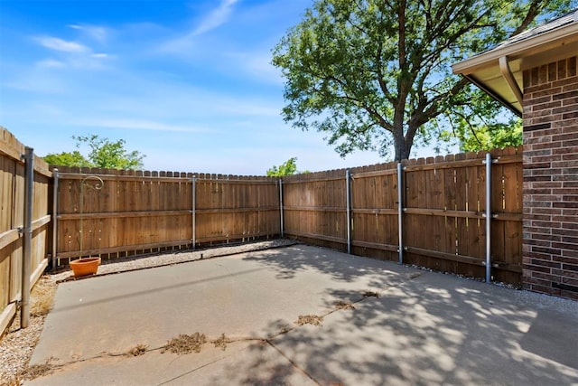 view of patio with a fenced backyard