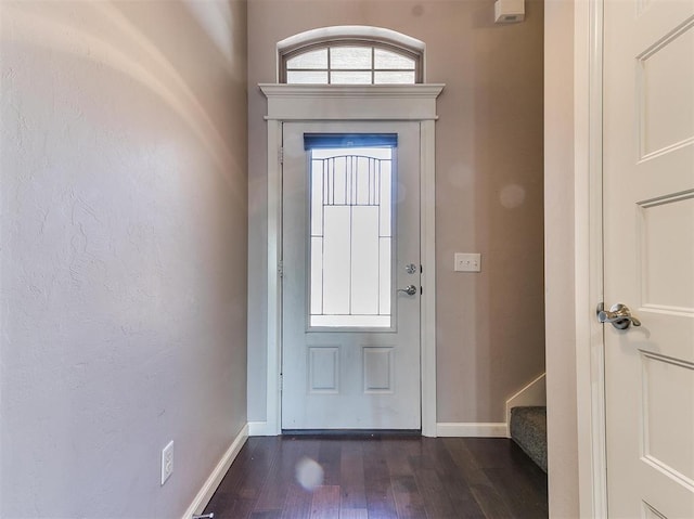 2408 Santa Monica St, Edmond, OK 73034 - foyer with dark wood finished floors, baseboards, and stairway