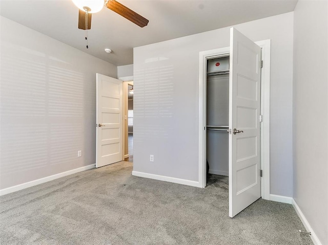 2408 Santa Monica St, Edmond, OK 73034 - unfurnished bedroom featuring carpet flooring, baseboards, a closet, and a ceiling fan