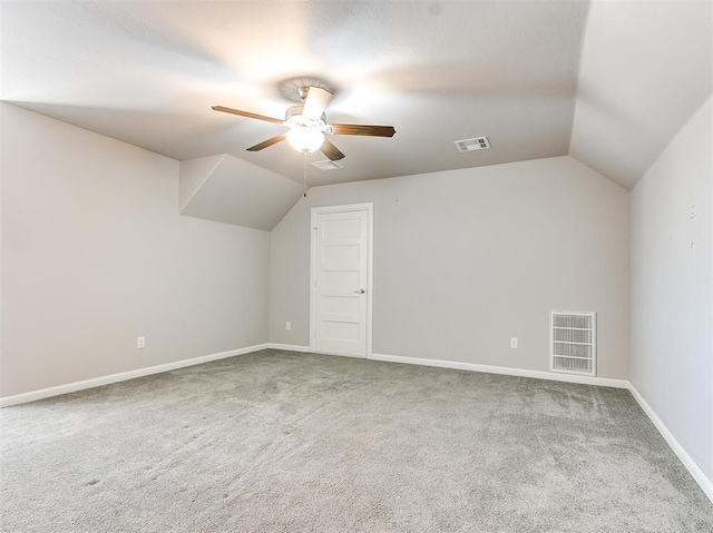 2408 Santa Monica St, Edmond, OK 73034 - bonus room with lofted ceiling, carpet floors, ceiling fan, and baseboards