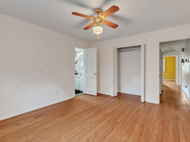 6120 Kingston Rd, Oklahoma City, OK 73122 - unfurnished bedroom with light wood-type flooring, baseboards, a closet, a ceiling fan, and ensuite bathroom