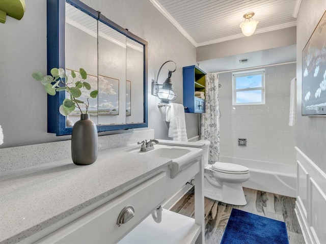 6120 Kingston Rd, Oklahoma City, OK 73122 - bathroom featuring ornamental molding, wood finished floors, vanity, toilet, and shower / tub combo with curtain