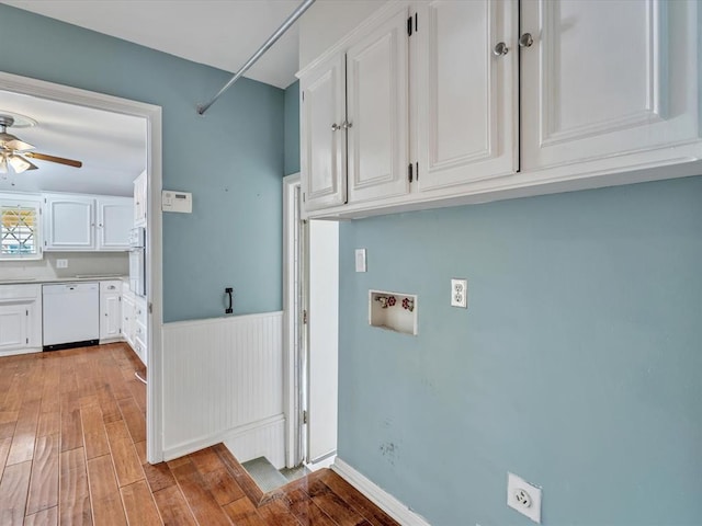 6120 Kingston Rd, Oklahoma City, OK 73122 - laundry room with a ceiling fan, hookup for a washing machine, light wood-type flooring, cabinet space, and electric dryer hookup