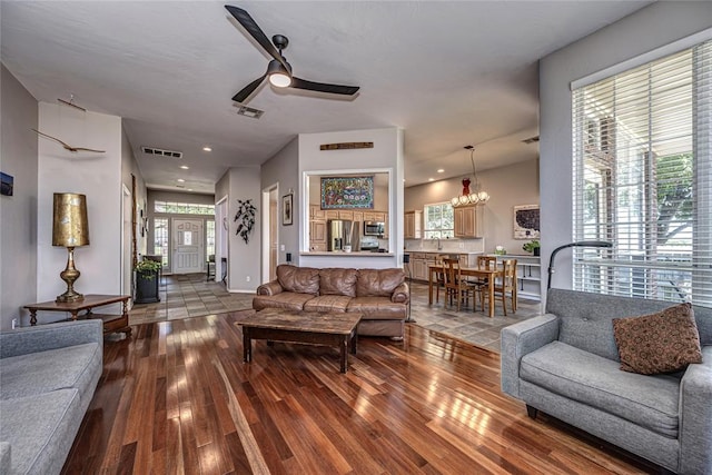 3001 NE 129th St, Edmond, OK 73013 - living area featuring hardwood / wood-style floors, ceiling fan, a chandelier, and recessed lighting
