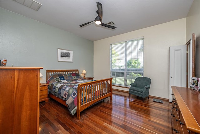 3001 NE 129th St, Edmond, OK 73013 - bedroom with dark wood finished floors, a ceiling fan, and baseboards