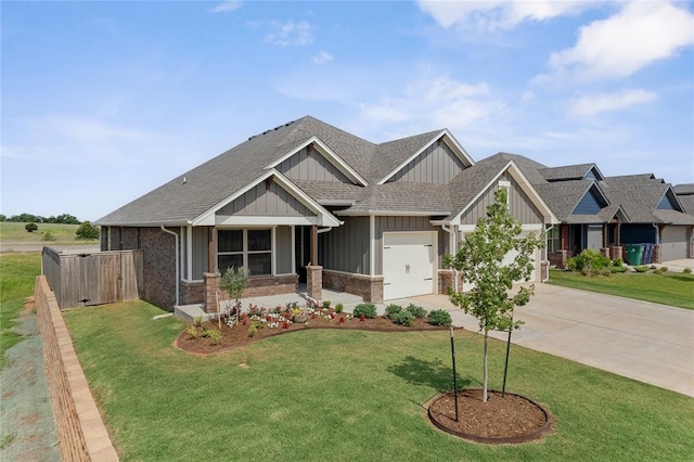 craftsman inspired home featuring board and batten siding, an attached garage, a shingled roof, and driveway