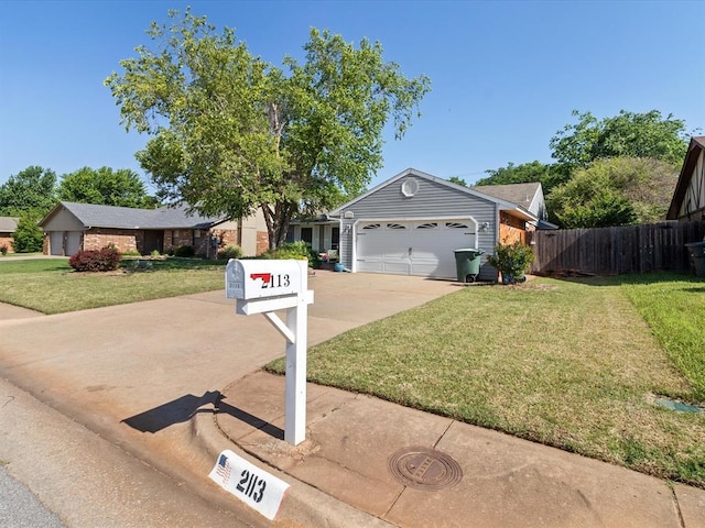 2113 Castle Rock, Edmond, OK 73003 - view of front of house featuring a garage and driveway