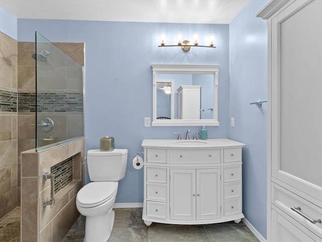 2113 Castle Rock, Edmond, OK 73003 - bathroom featuring toilet, baseboards, and a walk in shower