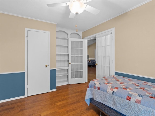 2113 Castle Rock, Edmond, OK 73003 - bedroom featuring wood finished floors, ornamental molding, baseboards, and ceiling fan