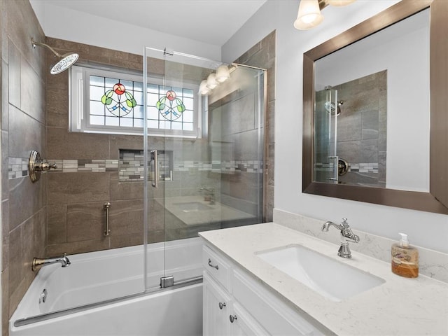 2113 Castle Rock, Edmond, OK 73003 - full bathroom featuring vanity and shower / bath combination with glass door