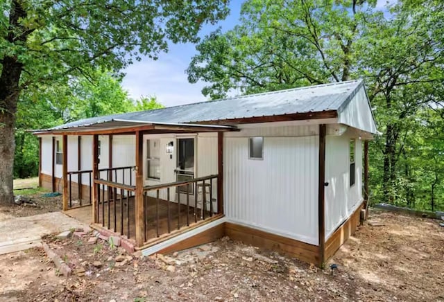 168 Bobber Rd, Broken Bow, OK 74728 - back of house with metal roof
