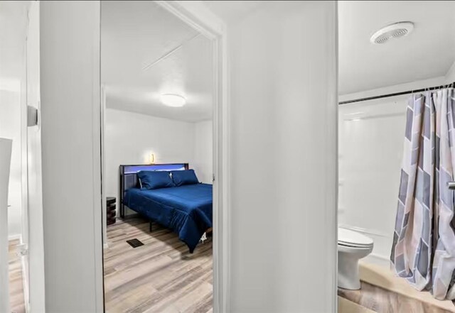 168 Bobber Rd, Broken Bow, OK 74728 - bedroom featuring wood finished floors