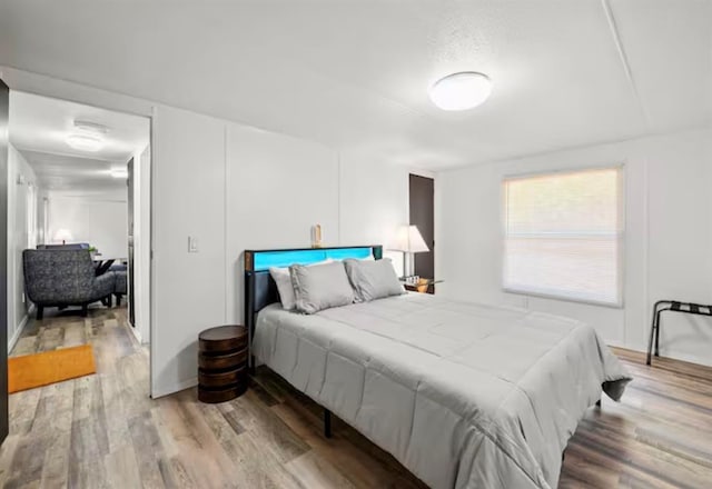 168 Bobber Rd, Broken Bow, OK 74728 - bedroom with wood finished floors