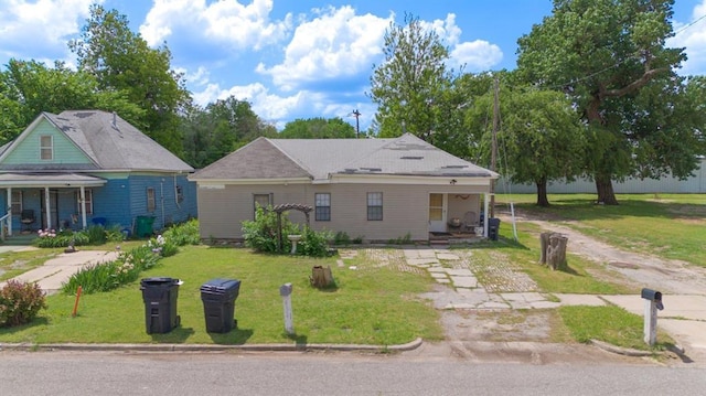 430 SW 11th St, Oklahoma City, OK 73109 - view of front of house with a porch and a front lawn