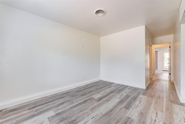 1316 W Logan Ave, Guthrie, OK 73044 - empty room with light wood-type flooring and baseboards